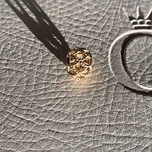 Authentic Pandora 14k gold wanderlust charm.